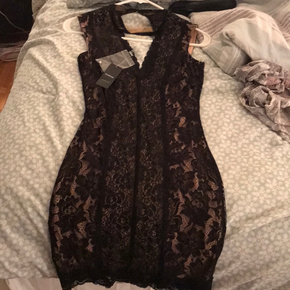 Bebe lace dress with tags !